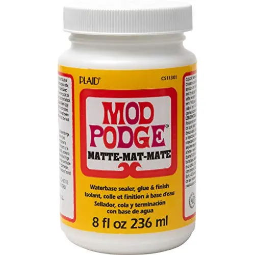 Mod Podge Matte bottle showing matte finish application on craft project