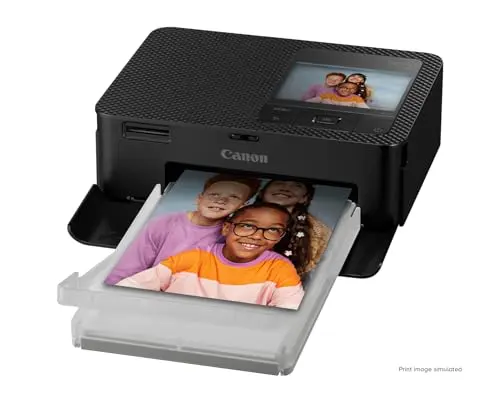 Canon Selphy CP1500 compact photo printer producing 4x6 prints