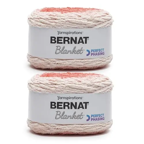 Bernat Blanket Perfect Phasing yarn in crimson color showing gradient effect