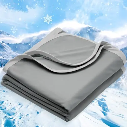 PHF cooling blanket spread on a bed