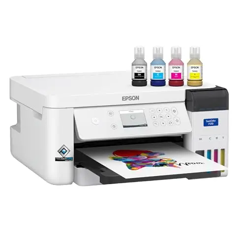 Epson SureColor F170 dye-sublimation printer on desk with sample prints