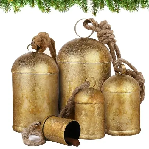Set of handmade vintage cow bells with jute rope for Christmas decoration