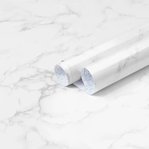 Heroad white and grey marble contact paper applied to a bathroom countertop