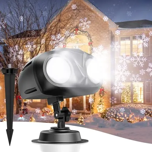 Hiketrax dual-head snowflake projector creating high-definition snowfall effects on yard